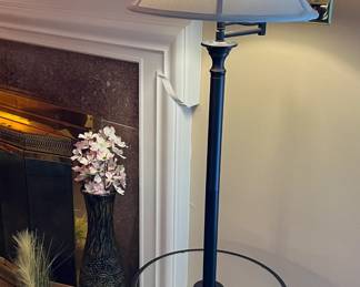 Pole lamp with glass table