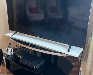 TCL 55" TV on stand