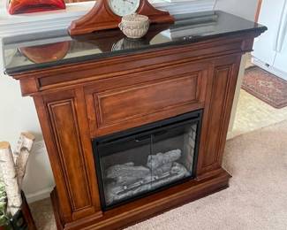 Electric faux fireplace with marble top 