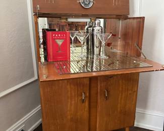 1950s MCM walnut bar cabinet with original mirrors, olive picks, accessories 
