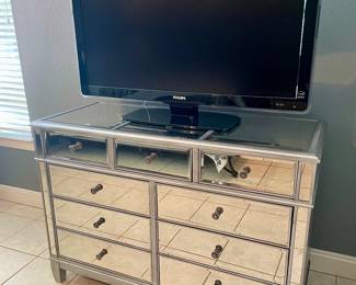 Mirrored Chest 36” T x 21” D x 51”W $500