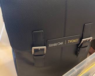 Wine Rep's Leather rolling carrier