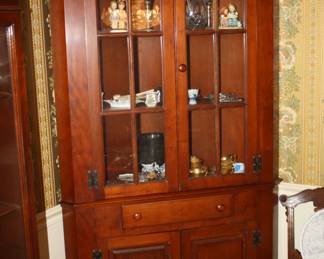 There are a pair of beautiful corner cabinets both in excellent condition
