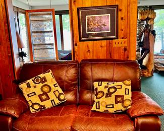 THE LEATHER LOVESEAT WITH RECLINING ENDS