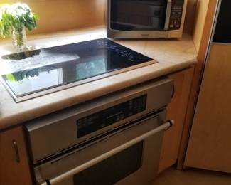 Jenn-Air wall oven; WOLF cooktop; Toshiba microwave oven