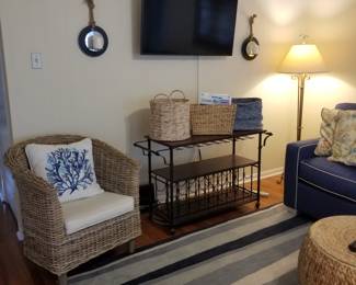 Bar cart; flat screen TV with bracket; floor lamp
