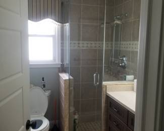 Glass shower surround