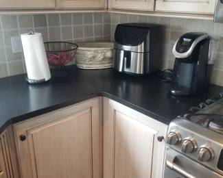 Kitchen cabinetry detail; small kitchen appliances