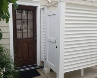 Entry door; shower surround