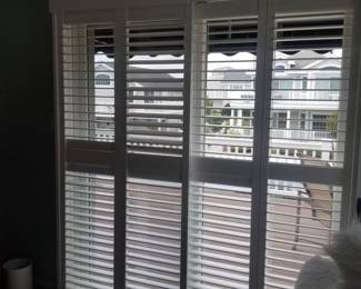 Plantation shutters for sliding glass doors