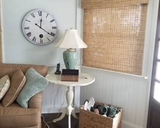 Accent table; table lamp; wall clock
