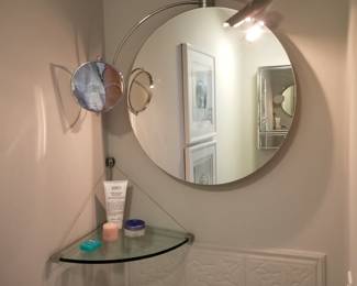 Eileen Gray inspired illuminated mirror with magnifying mirror; glass corner shelf 