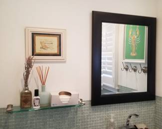 Glass shelf; black frame mirror