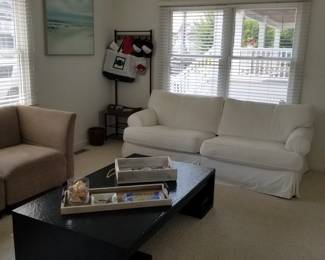 Cozy white slipcovered couch