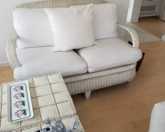 White wicker loveseat by Henry Link