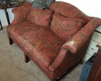 Chippendale style paisley print loveseat 