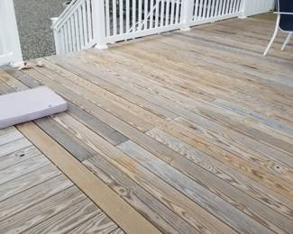 Nearly new wood decking; vinyl railing