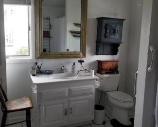 Bath vanity, mirror, toilet and more