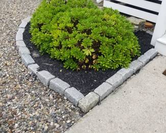 Belgian blocks; plantings; stones