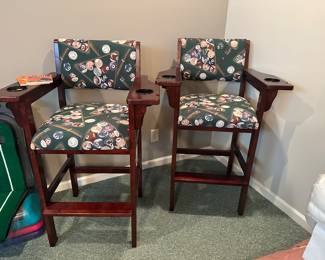 Two of three available pool bar chairs