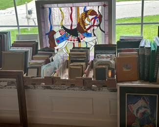 Handcrafted stain, glass window art…
Lots of picture frames