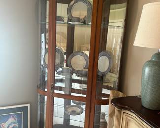 Curved glass display cabinet