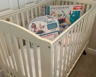 Lightly used crib and baby toys