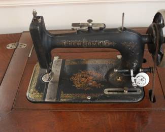1890’S NEW HOME  CABINET SEWING MACHINE WITH ORIGINAL OWNERS MANUEL
