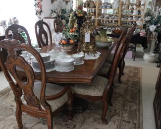 RUG IS 7'10"X11'2" MADE BY PACIFIC RIM, LARGE BEAUTIFUL ORNATE DINING TABLE WITH PADS AND 6 SIDE CHAIRS, TWO ARM CHAIRS