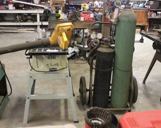 DELTA TABLE SAW AND ELECTRIC BLOWER.  CUTTING TORCHES AND CART WITH TANKS
