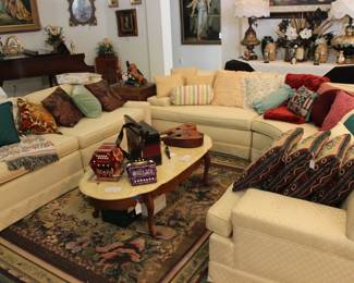 SECTIONAL SOFA,  MARBLE TOP COFFEE TABLE, ASSORTED PILLOWS AND MUSICAL INSTRUMENTS