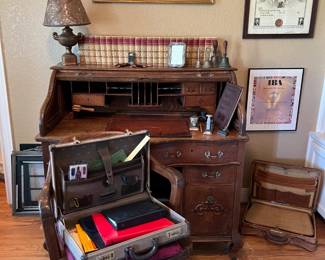 Antique roll-top desk - $200, Antique Wooden Desk Chair - $75, Vintage briefcases
