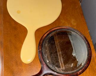 Mirror, mirror … these handheld beveled mirrors would work great as part of a wall grouping or to grace a dresser. 