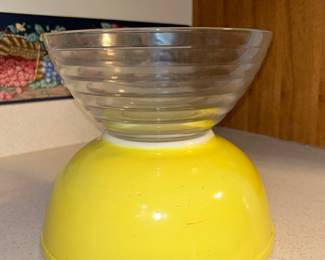 Bright yellow Pyrex and other bowls are ready for more kitchen duty. 