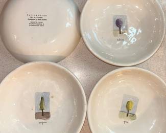 Four Pottery Barn bowls with inspiring words. 