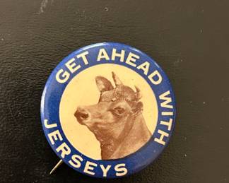 Notice this jersey cow’s headpiece. This unique button is sure to moove conversation to the fun side. 