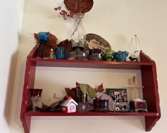 Ruby souvenir glasses and blue glass add pops of color and nostalgia. 