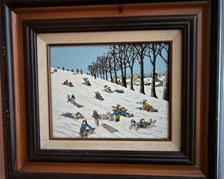 An image that evokes fun and order with scattered sledders bound by a row of trees.