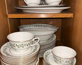 A wreath of dogwood blooms shine on this fine china. 