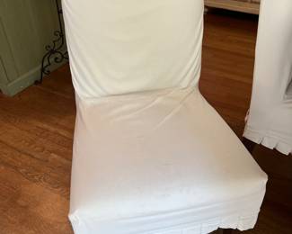 Six Slipcovered & upholstered Couture chairs by Ballard Design. Covered in white duck slipcovers. 38" tall x 17" wide.