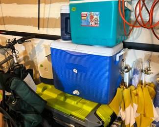 Coolers - the bottom one is Igloo, heavy duty, new and on wheels