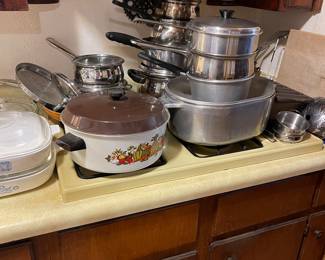 Variety of pots, pans, Pyrex, Corning ware, utensils, etc