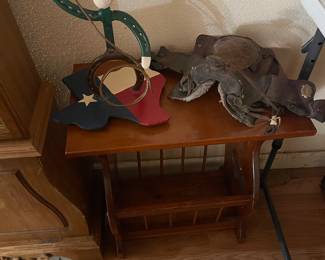 early American magazine table with a few whimsical western decor items