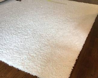 White shag rug, 12’ x 18’