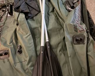 Oars with sturdy inflatable raft, fix’s in a hefty bag. 