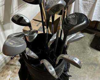 Golf clubs, golf bag, golf balls, golf glove