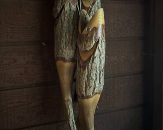 Hand carved hanging fish. 