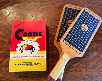 Vintage Cootie game and pair of vintage Official Sportcraft tether ball bats