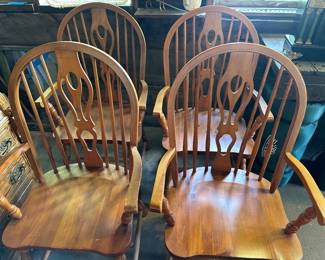 Set of four wingback captains chairs in good sturdy condition
