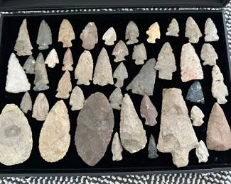 Native artifacts: arrowheads, Celts, axe heads, primitive bows